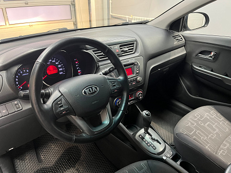 KIA Rio 1.6 AT (123 л.с.) 2013