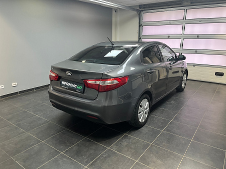 KIA Rio 1.6 AT (123 л.с.) 2013