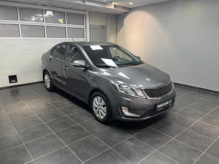 KIA Rio 1.6 AT (123 л.с.) 2013