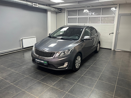KIA Rio 1.6 AT (123 л.с.) 2013